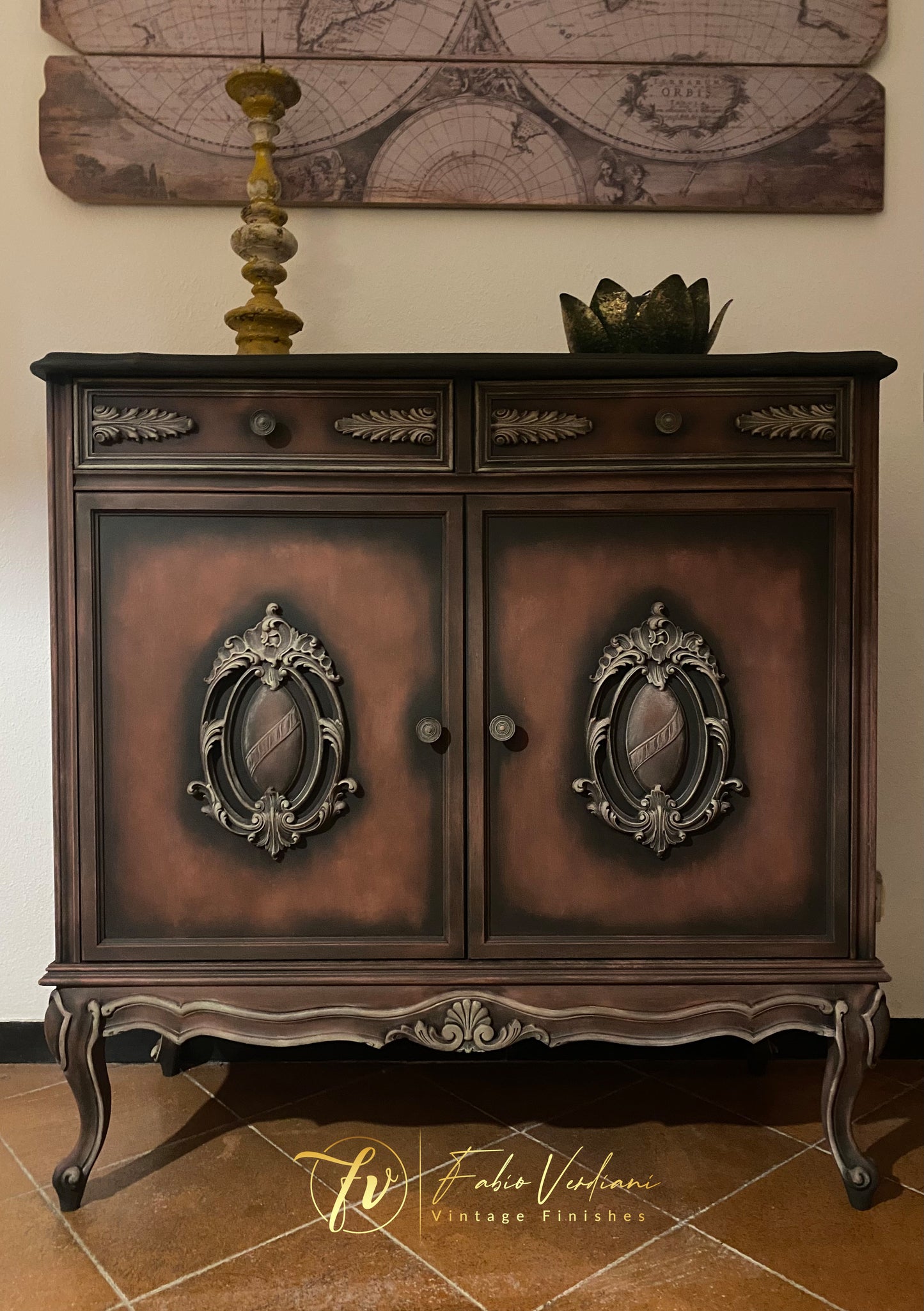 Small cabinet with a base of Annie Sloan Graphite, dry brushing in Primer Red and details in Versailles Yellow. Stencils on each side, clear  and black wax.