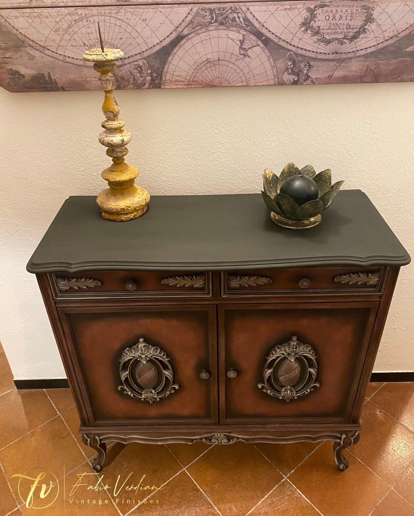 Small cabinet with a base of Annie Sloan Graphite, dry brushing in Primer Red and details in Versailles Yellow. Stencils on each side, clear  and black wax.