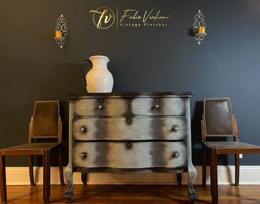 Ball and claw serpentine chest of drawers in graphite, dusty blue and antique silver paint