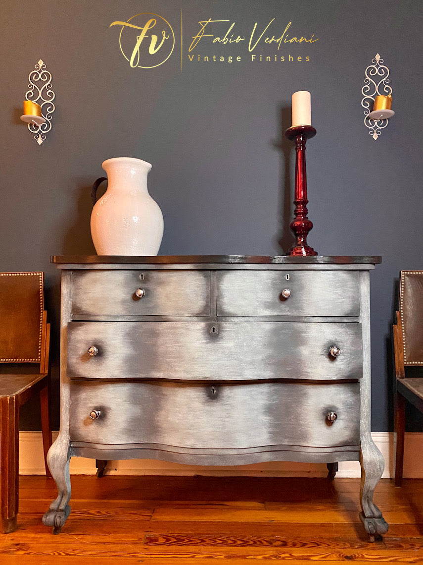 Ball and claw serpentine chest of drawers in graphite, dusty blue and antique silver paint