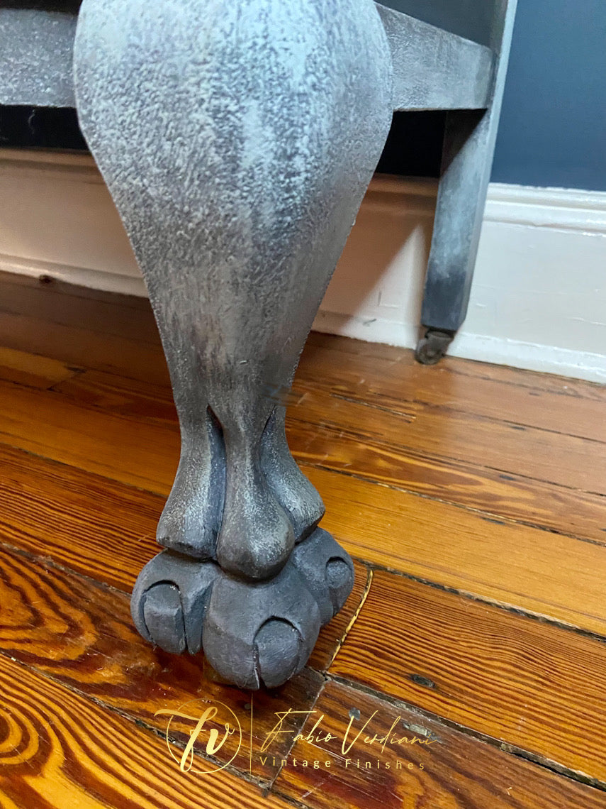 Ball and claw serpentine chest of drawers in graphite, dusty blue and antique silver paint